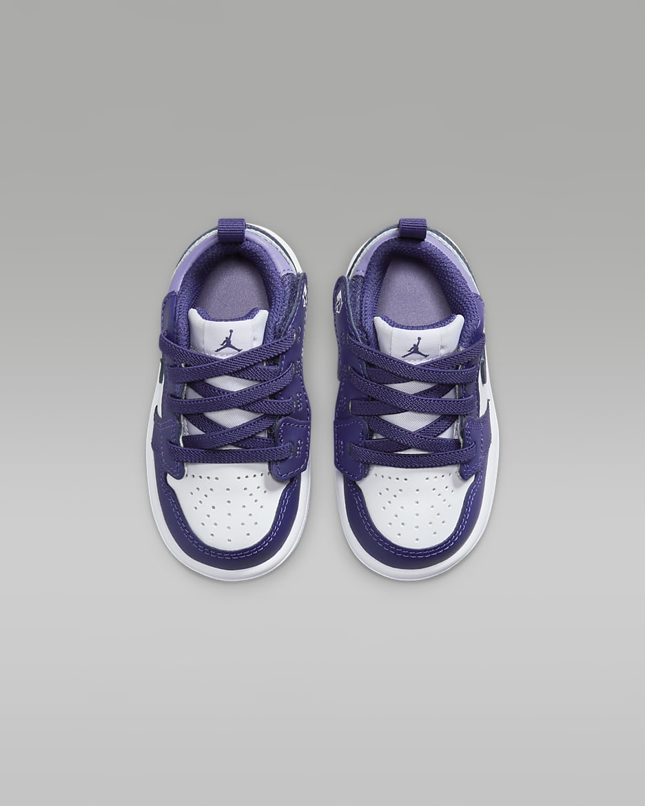 Purple and white toddler jordans top